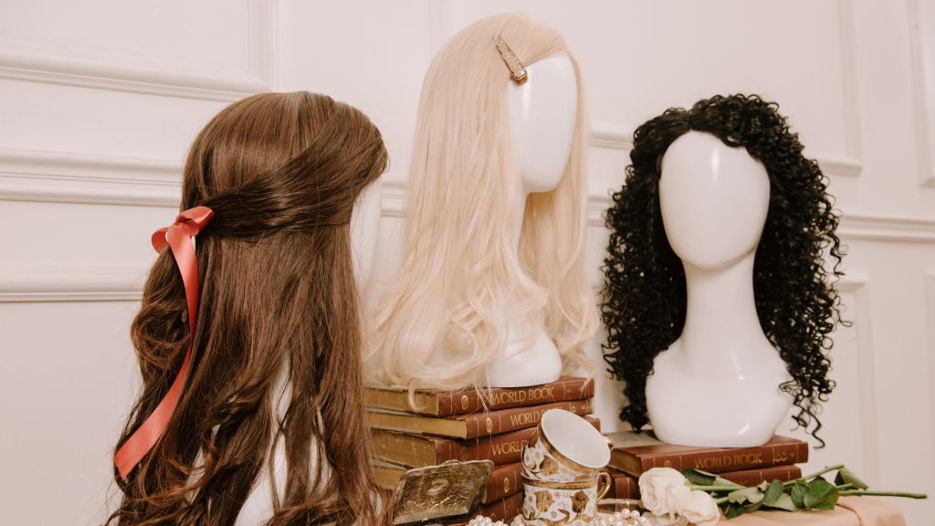 3 different variety if wig in a table